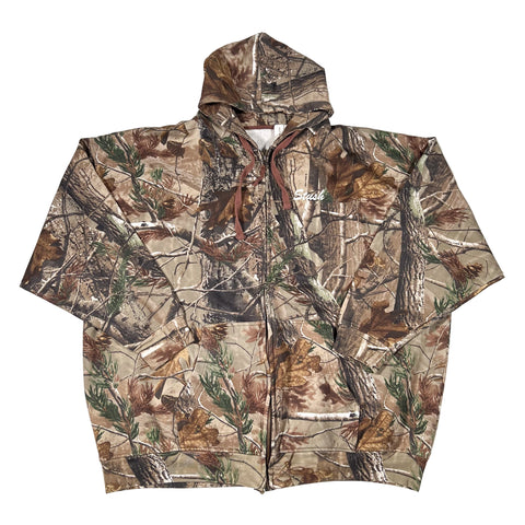 Camouflage-patterned shirt on a white background