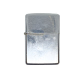 Silver Zippo lighter on a textured white background