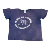 Blue t-shirt with 'Peterlee Carnival Half Marathon' text and graphic on a white background