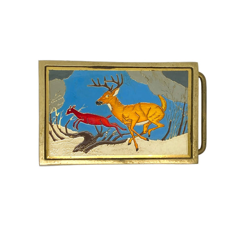 Belt buckle with deer and red fox design on a white background