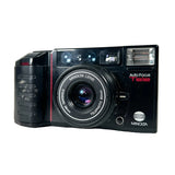 Minolta auto focus camera on a white background