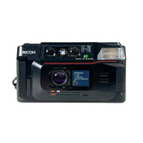 Vintage Ricoh camera on a white background