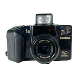 Vintage Konica camera with 'Z-up' branding on a white background