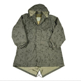 Green checkered raincoat on a white background