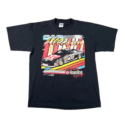 A vintage black short-sleeve t-shirt featuring a colorful graphic of a 1994 NASCAR Winston Cup race at Texas with Dale Earnhardt's car, number 28, and 'Havoline Racing' logos.