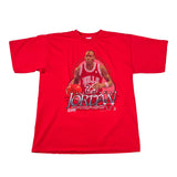 A red short-sleeve graphic T-shirt laid flat on a white surface, featuring a large front print of basketball player Michael Jordan in a Chicago Bulls jersey with the text 'Michael Jordan Chicago Bulls' and his number 23.