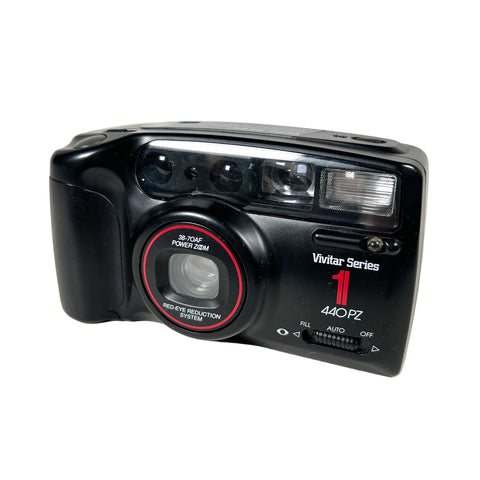 Black Vivitar Series 1 camera on a white background
