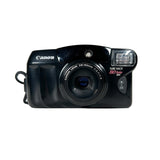 Black Canon camera on a white background