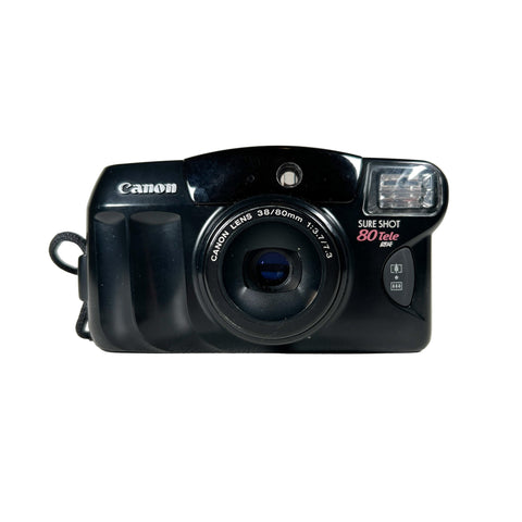 Black Canon camera on a white background