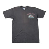 A dark charcoal gray short-sleeve t-shirt laid flat on a white background, featuring a 'Gauley River' wave graphic on the left chest.