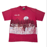 Red t-shirt with wolf graphic and 'Jackson Hole' text on a white background