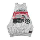 A light gray heather sleeveless tank top featuring a large graphic print of a black and red Harley-Davidson motorcycle with the brand name in red and black text, laid flat on a light background.