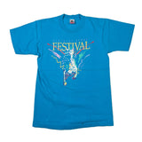 A bright blue short-sleeve t-shirt laid flat on a light background, featuring a colorful graphic print on the front with the words 'Kentucky Derby Festival' and a stylized running horse illustration.