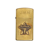 A vintage brass Marlboro lighter with 'JMN' engraved on the lid and the classic star logo on the front, set against a white textured background.