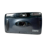 A Minolta Freedom Vista film camera in a dark navy blue color, photographed from the front against a light gray background.