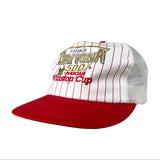 A 1993 Daytona 500 Winston Cup trucker hat with a white front panel featuring red pinstripes and a red brim, with gold and red embroidered text on the front.