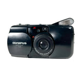 Black Olympus camera on a white background