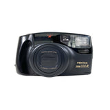 Black Pentax camera with flash on a white background