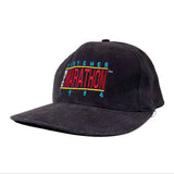 Black cap with colorful text on a white background