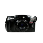 Black Canon camera on a white background