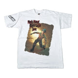 A white short-sleeve graphic T-shirt laid flat on a light gray surface. The shirt features a large vintage-style print on the front with the text 'Not Your Average Joe' above an action figure illustration, and 'GI JOE' printed on the sleeve.