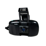 Black Kodak camera on a white background