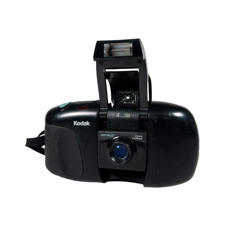 Black Kodak camera on a white background