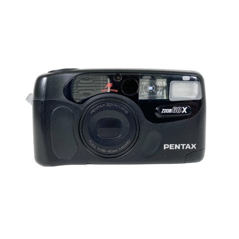 Black Pentax camera on a white background