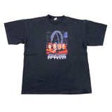 A faded black short-sleeve graphic t-shirt featuring the Star Trek crew and 'Star Trek Voyager' text on the front, laid flat on a white surface.