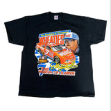 Black t-shirt with a racing car and athlete graphic on a white background