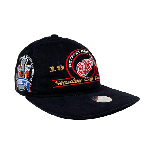 Black cap with Detroit Red Wings logo and text on a white background