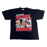 Black t-shirt with Atlanta Falcons graphic on a white background