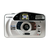 Silver camera with 'Bell & Howell' branding on a white background