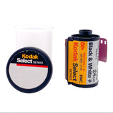 Kodak Select Series BWC Black & White + 24 Expo film roll with its circular lid cap and a white plastic film holder on a white background.