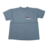 A faded blue short-sleeve t-shirt with a 'New Orleans Saints Jazz' graphic printed on the center chest, laid flat on a white background.