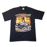 A black short-sleeve graphic T-shirt laid flat on a white background. The front features a large print of a 1992 race car with the words 'Venezio 92 Champion' and 'Intimidator,' plus oversized reflective sunglasses.