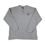 Gray long-sleeve shirt with a small design on a white background