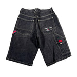 Black denim shorts with Tommy Jeans logo on a white background