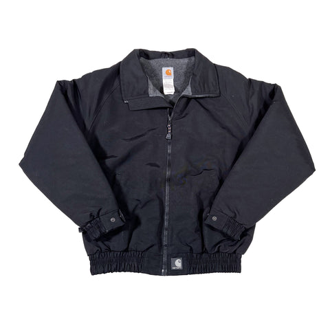 Folded black jacket with a brand label on a white background