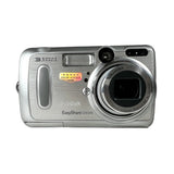 A silver Kodak EasyShare DX6340 digital camera with a textured metallic finish, featuring a prominent lens, flash, and grip on a light gray background.