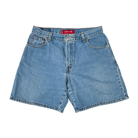 Blue denim shorts with a brand label on a white background
