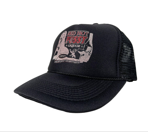 Black trucker cap with red and white graphic on a white background