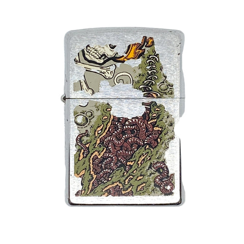 Zippo lighter with a detailed design on a white background