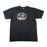 A black short-sleeve t-shirt laid flat on a white background, featuring a graphic print on the chest that reads 'Rise Week 3 2005' with a bull and a flag design.