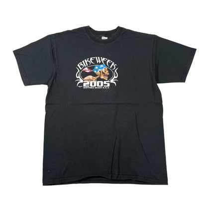 A black short-sleeve t-shirt laid flat on a white background, featuring a graphic print on the chest that reads 'Rise Week 3 2005' with a bull and a flag design.