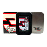 A Zippo lighter tin featuring a collectible signed photo of Pete Nichols. The silver metal tin is shown open, displaying the black insert with the photo, alongside its original black, red, and white branded box.