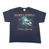 A vintage Disturbed band t-shirt in dark navy blue, featuring the 'Perfect Insanity' album artwork with a skull and green/blue glow, laid flat on a white background.