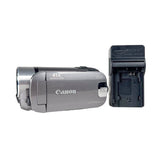 Canon video camera with battery pack on a white background