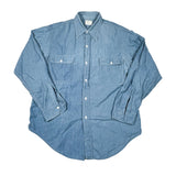 Blue denim shirt on a white background