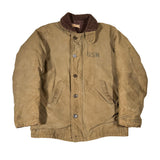 Brown jacket with 'USN' logo on a white background